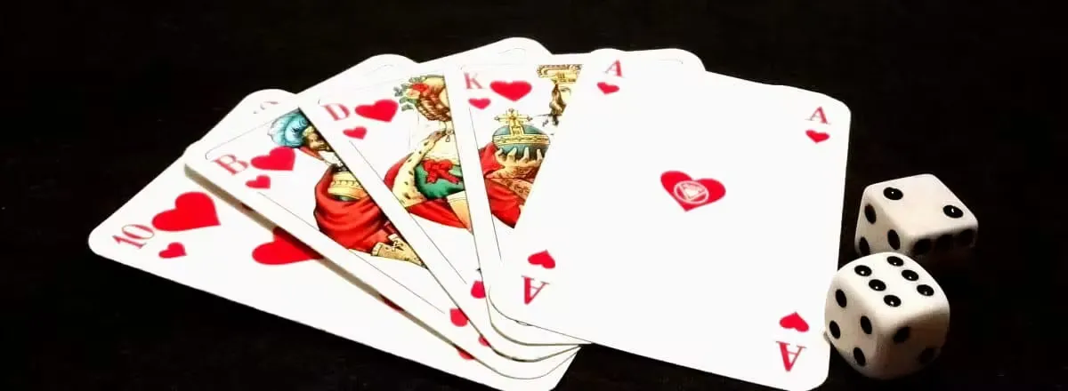 A skilled dealer at a high-limit roulette table with gilt accents — the iconic style of 5666Bet.