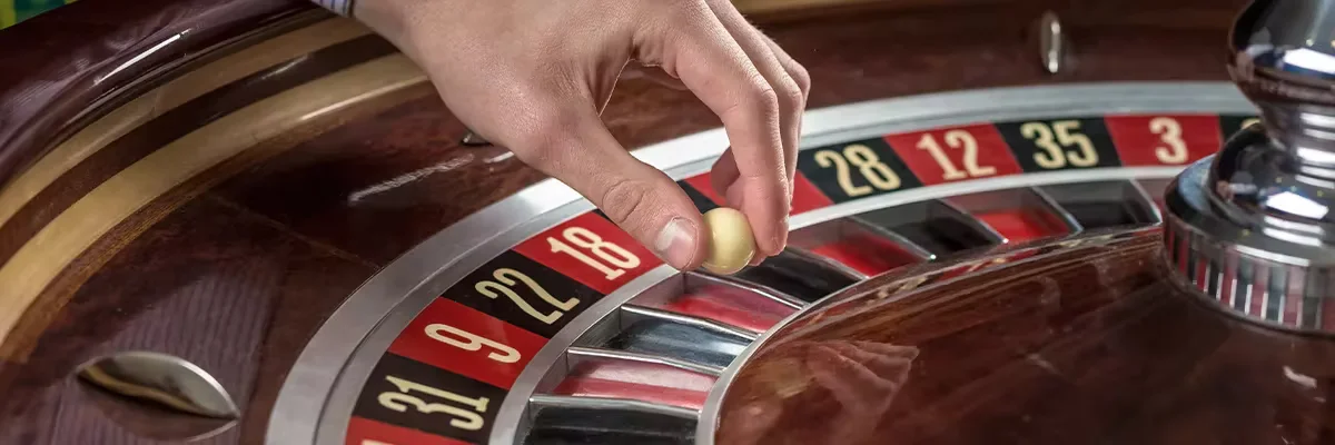 Busy player at a classy roulette board in a grand hall — the mark of 5666Bet quality in Bangladesh.